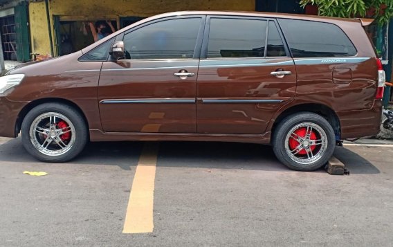 Brown Toyota Innova 2013 for sale in Quezon City-2