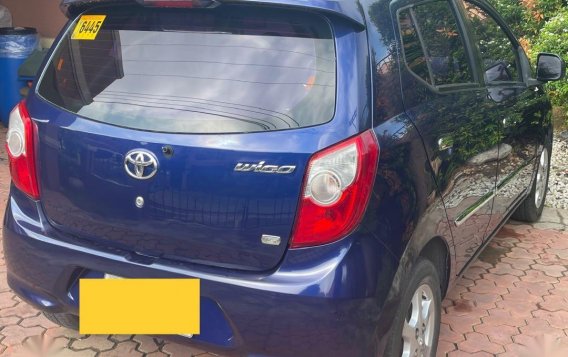 Blue Toyota Wigo 2015 for sale in Tarlac-3