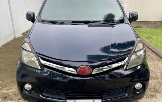 Selling Black Toyota Avanza 2014 in Taal-1