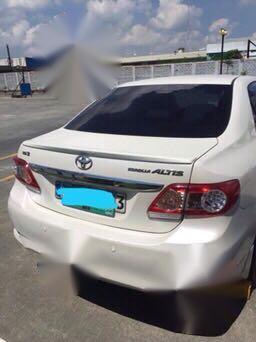 Pearl White Toyota Corolla Altis 2013 for sale in Silang-1