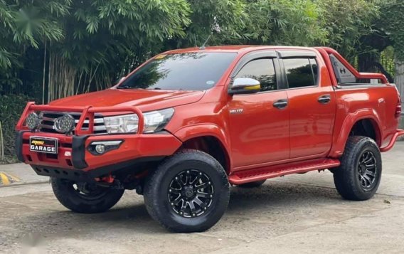 Selling Orange Toyota Hilux 2017 in Quezon City