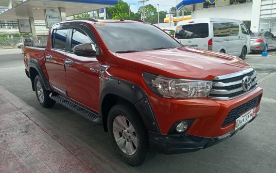 Selling Orange Toyota Hilux 2019 in Manila-1