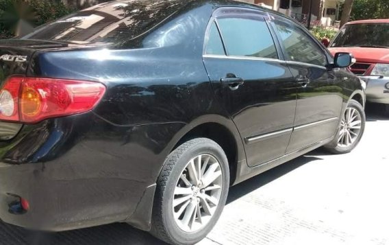 Black Toyota Corolla Altis 2010 for sale in Manual-9