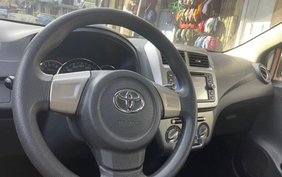 Pearl White Toyota Wigo 2014 for sale in Quezon City-8