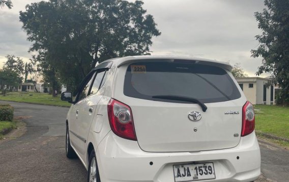 Pearl White Toyota Wigo 2014 for sale in Quezon City-2