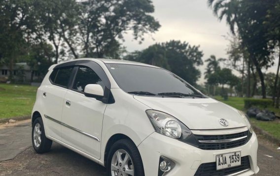 Pearl White Toyota Wigo 2014 for sale in Quezon City-6