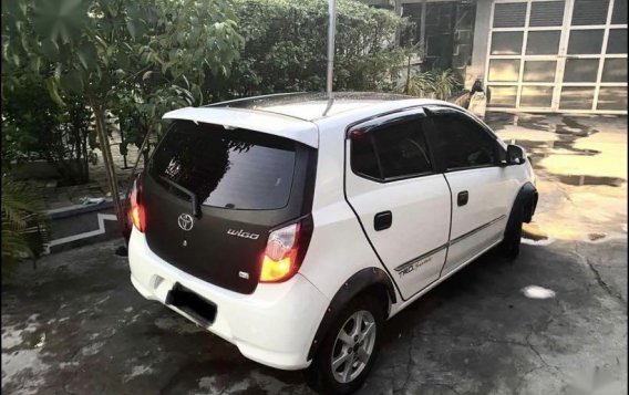 Selling White Toyota Wigo 2015 in Mexico-4