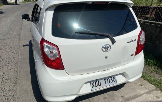 Selling White Toyota Wigo 2016 in Makati-4
