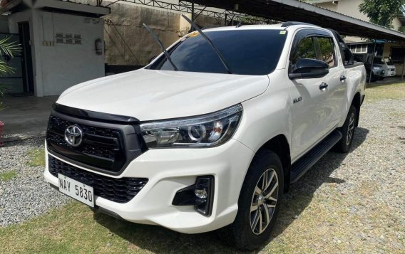 Selling White Toyota Hilux 2019 in Quezon City