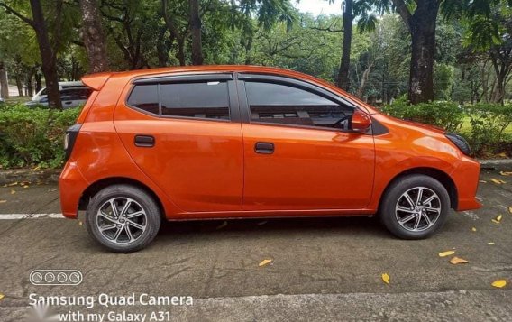 Selling Orange Toyota Wigo 2021 in Quezon City