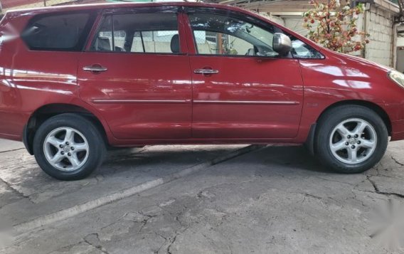 Red Toyota Innova 2005 for sale in Manila-4