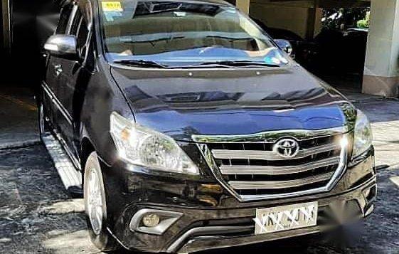Selling Black Toyota Innova 2014 in Makati-1