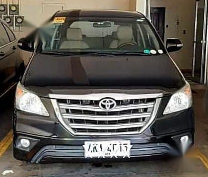 Selling Black Toyota Innova 2014 in Makati