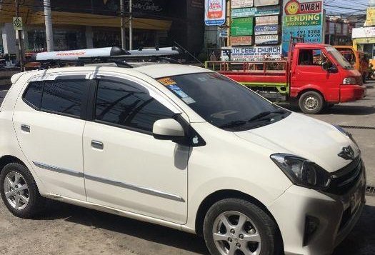 Sell White 2016 Toyota Wigo in Minglanilla-7