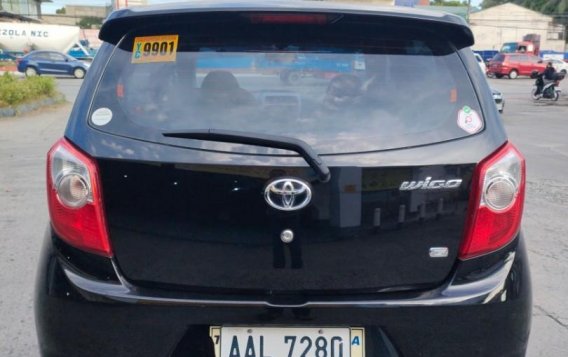 Black Toyota Wigo 2014 for sale in Manual-3