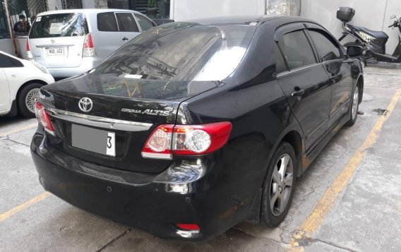 Selling Black Toyota Corolla Altis 2013 in Makati-2