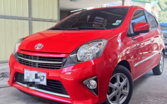 Selling Red Toyota Wigo 2016 in Quezon City