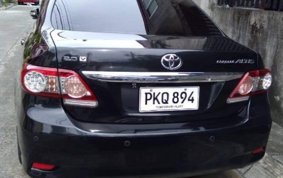 Selling Black Toyota Corolla Altis 2011 in Imus