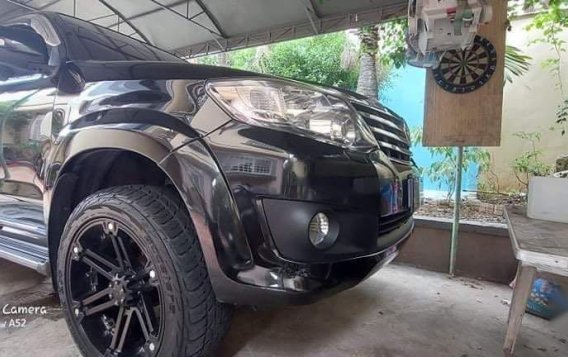 Selling Black Toyota Fortuner 2013 in Angono-8