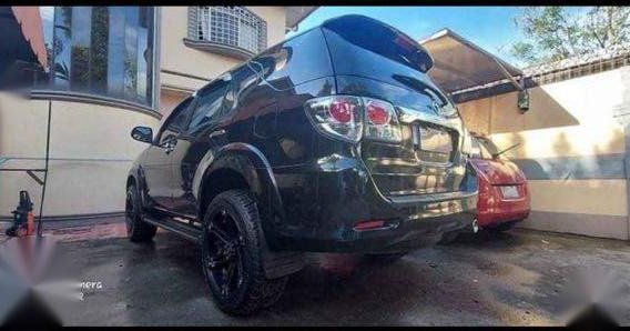 Selling Black Toyota Fortuner 2013 in Angono-2