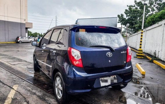 Sell Blue 2014 Toyota Wigo in Imus-1