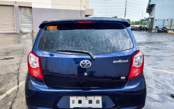 Sell Blue 2014 Toyota Wigo in Imus-3