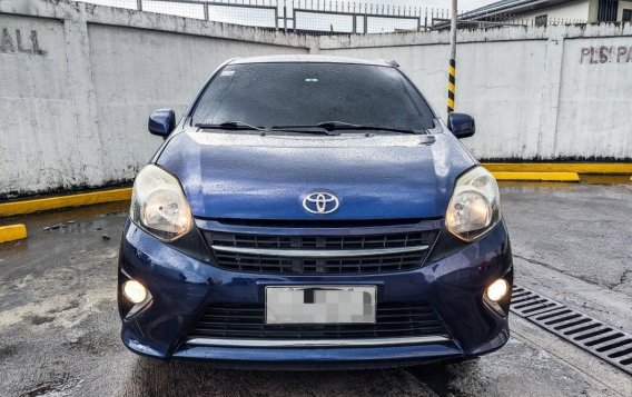 Sell Blue 2014 Toyota Wigo in Imus-2