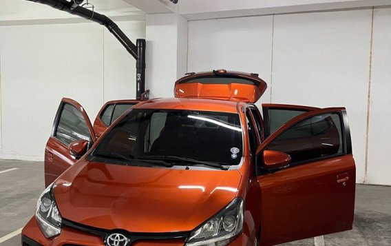 Sell Orange 2021 Toyota Wigo in Quezon City