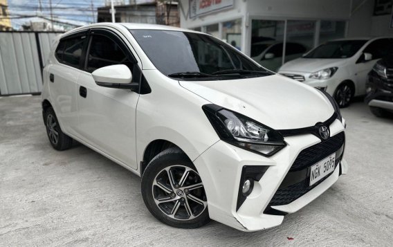 Selling White Toyota Wigo 2021 in Quezon City