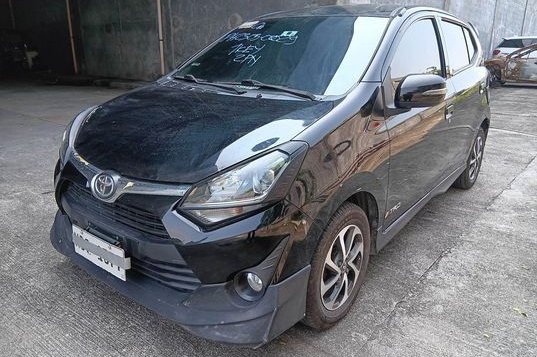 Selling White Toyota Wigo 2019 in Makati