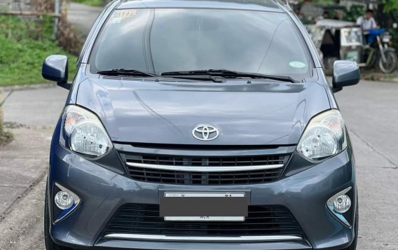 Sell White 2014 Toyota Wigo in Manila-1
