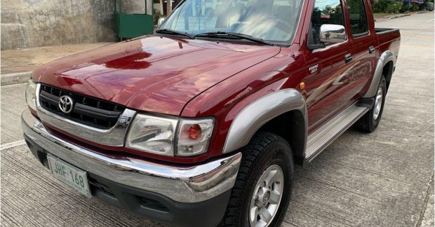 1999 maroon toyota hilux 4x4 pickup